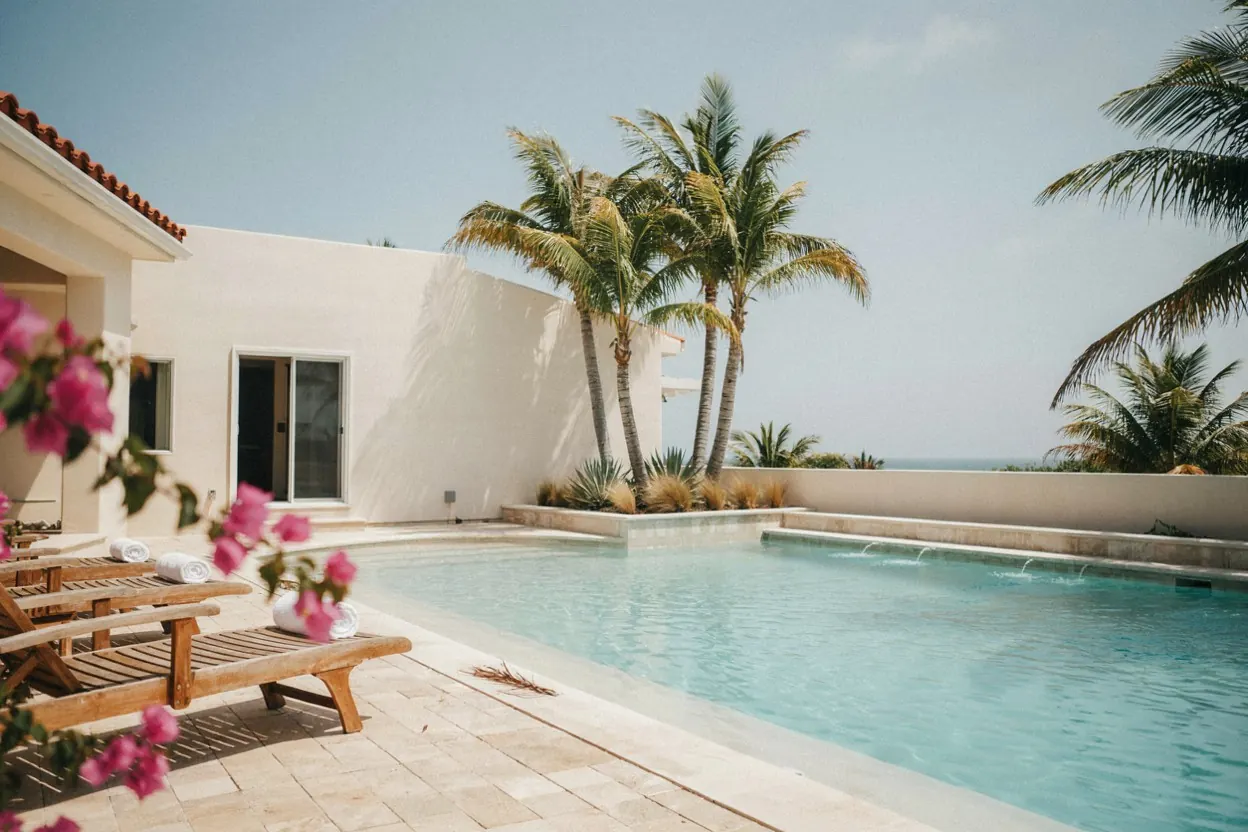 Coastal Bend backyard pool with palm trees