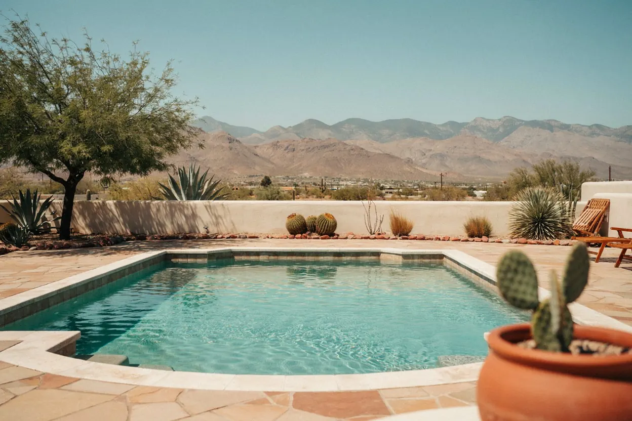 El Paso backyard pool with desert landscaping and the Franklin Mountains