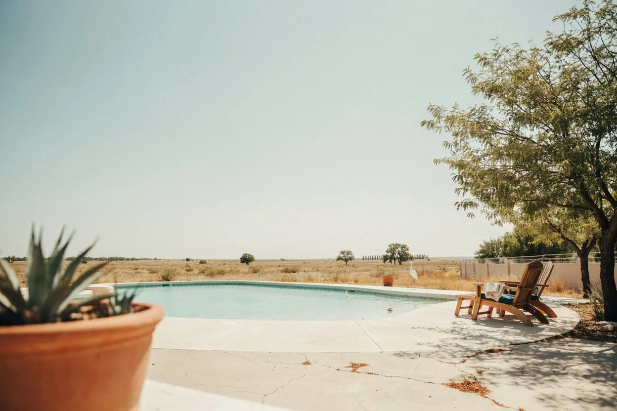 West Texas backyard pool under a wide open sky